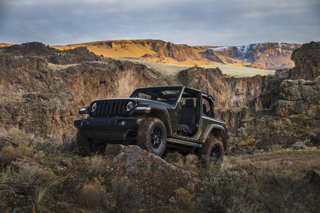 2024 Jeep Wrangler Willys parked in the mountains.