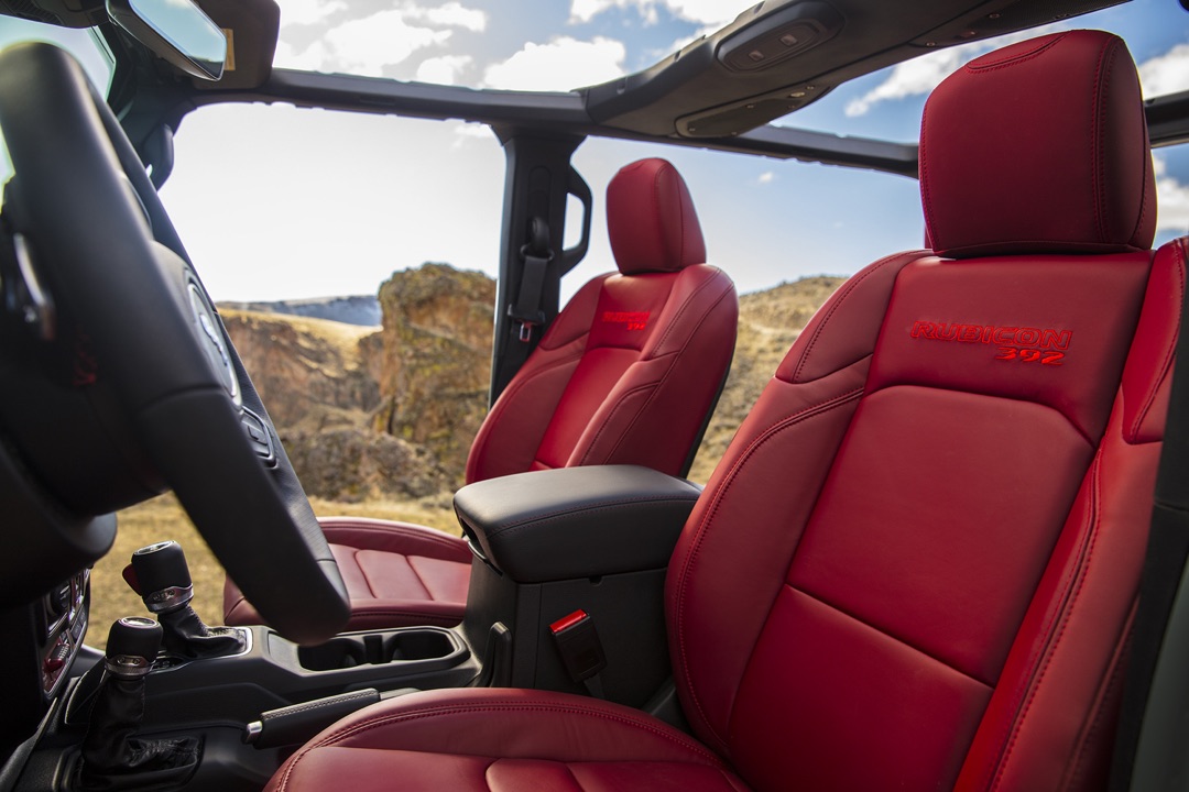 New 2024 Jeep Wrangler Rubicon 392 with 12-way power-adjustable red leather seats.