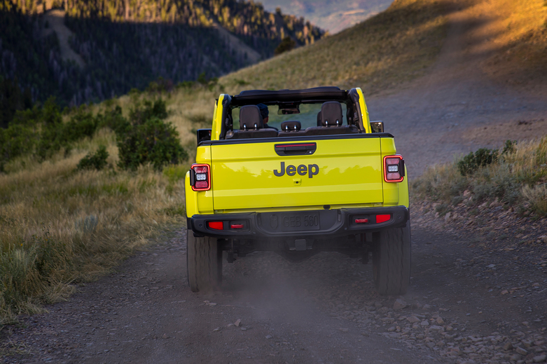 Rear view of Jeep Gladiator 2024 on mountain trail